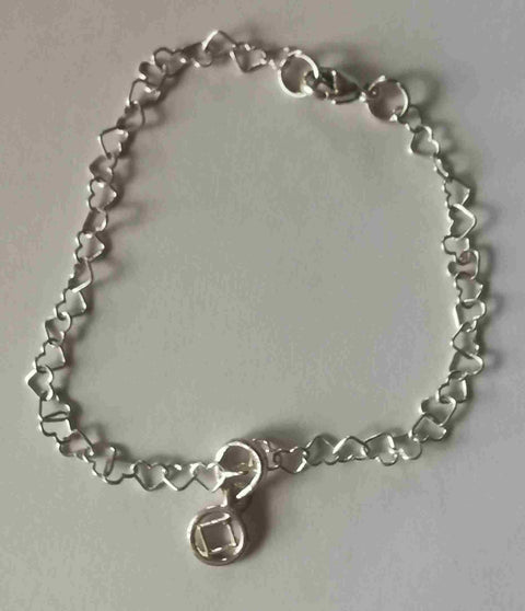 Silver bracelet small hearts with pendant